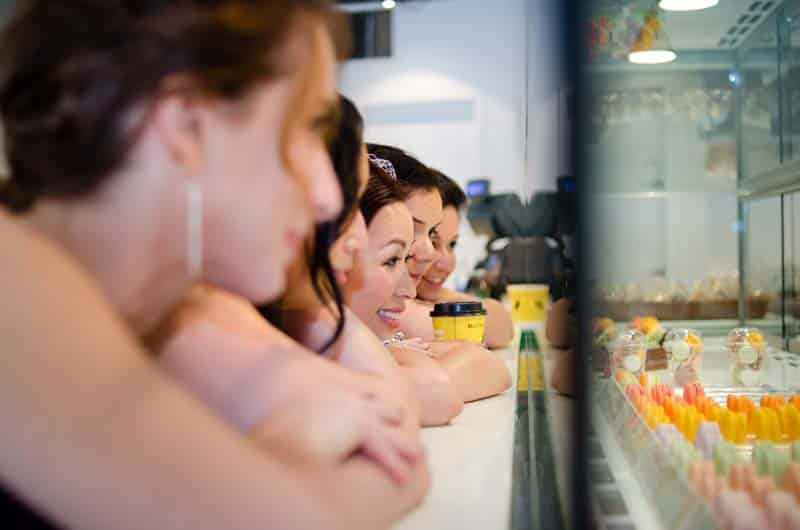 Wedding party at Butter Avenue, admiring the macarons. rebeccachan.ca