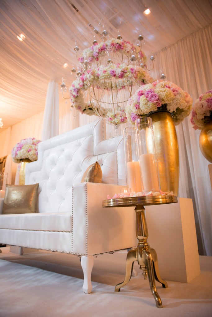 Custom floral chandelier and ornate seats for the bride and groom. rebeccachan.ca