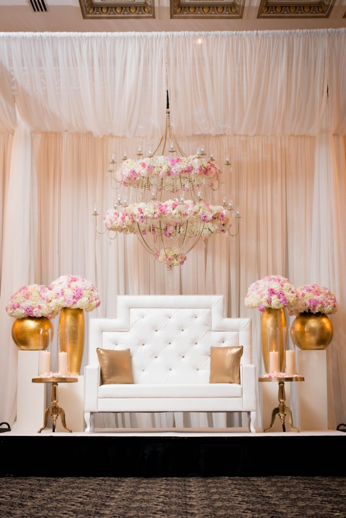 Pink and gold custom floral chandelier ready for the bride and groom. rebeccachan.ca