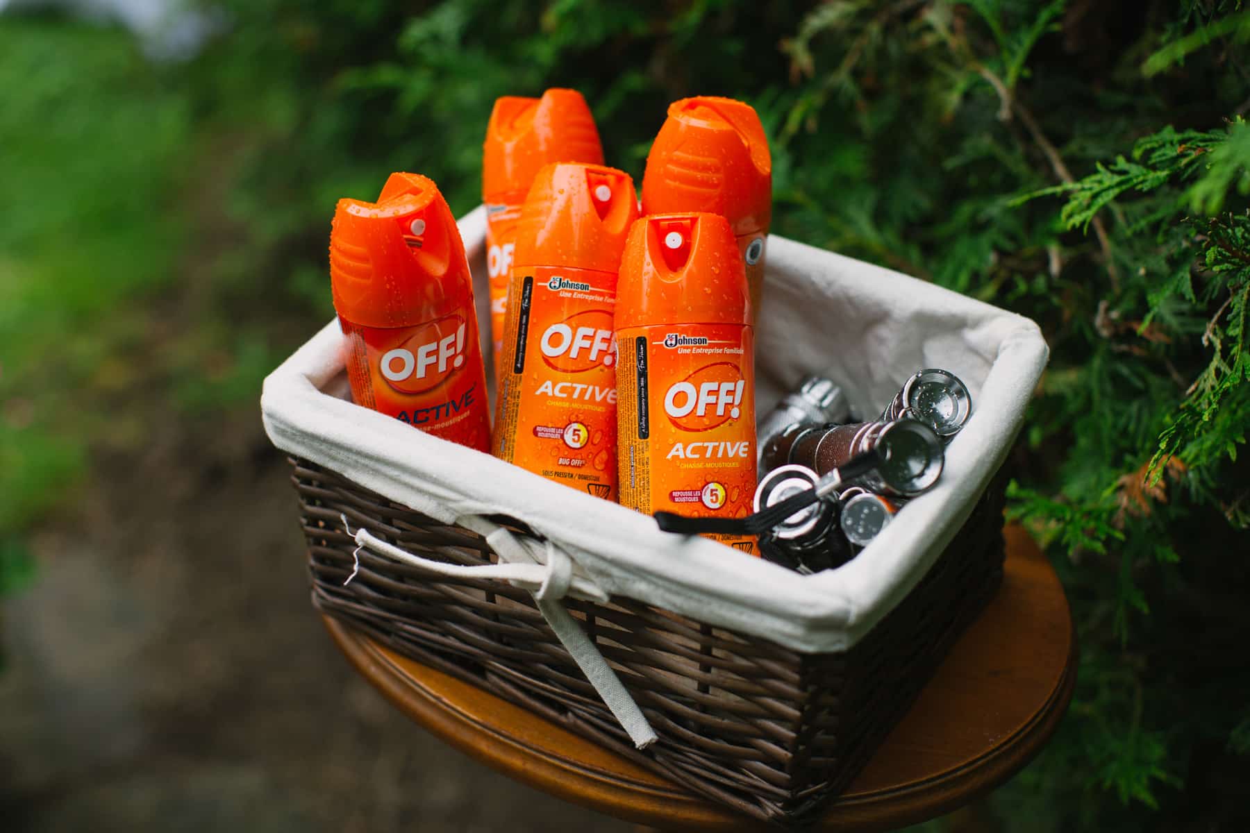 Guest basket with bug spray and flash lights at a backyard tented Ontario wedding. See more at Rebecca Chan Weddings and Events https://rebeccachan.ca