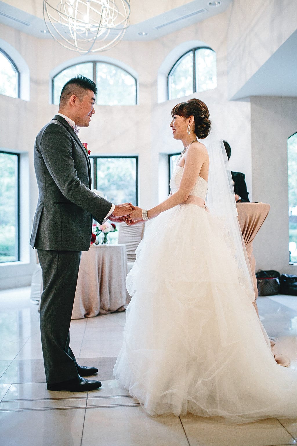 Bride and groom at their wedding ceremony. To see more, visit Rebecca Chan Weddings and Events https://rebeccachan.ca