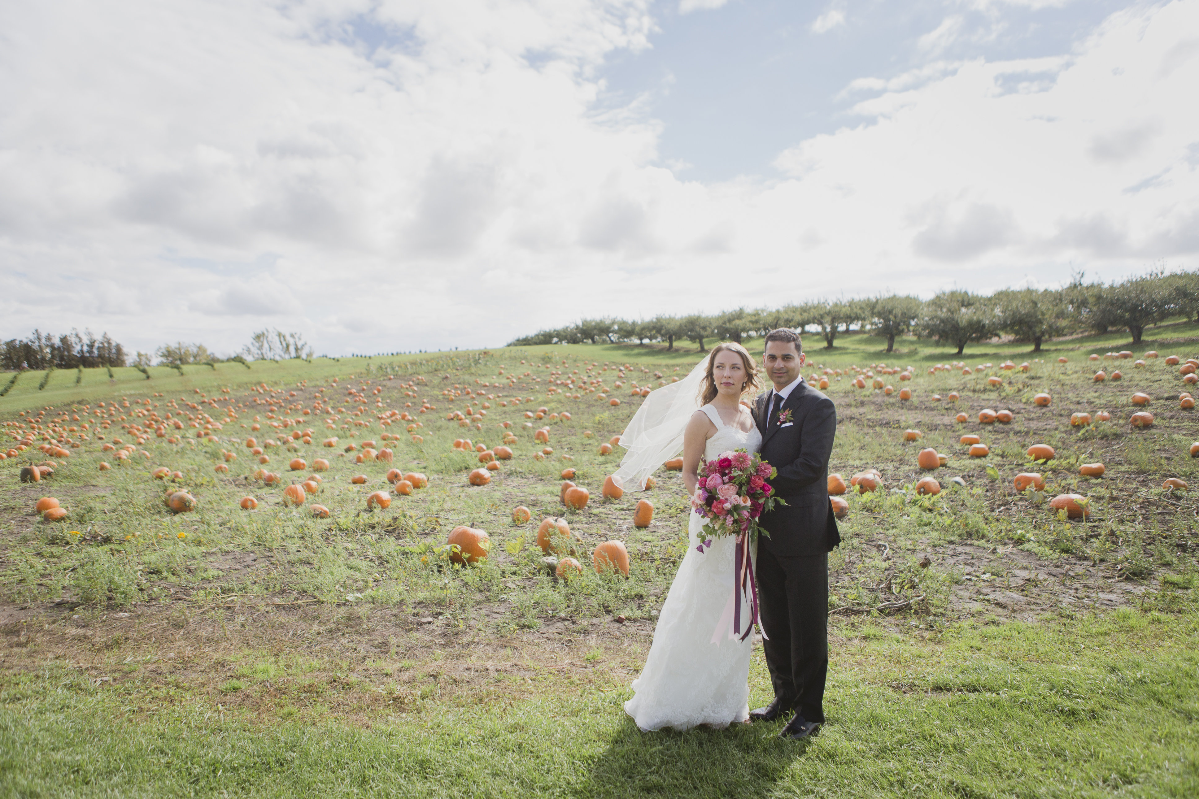 Romantic fall wedding photos in a pumpkin patch. See more at Rebecca Chan Weddings and Events https://rebeccachan.ca