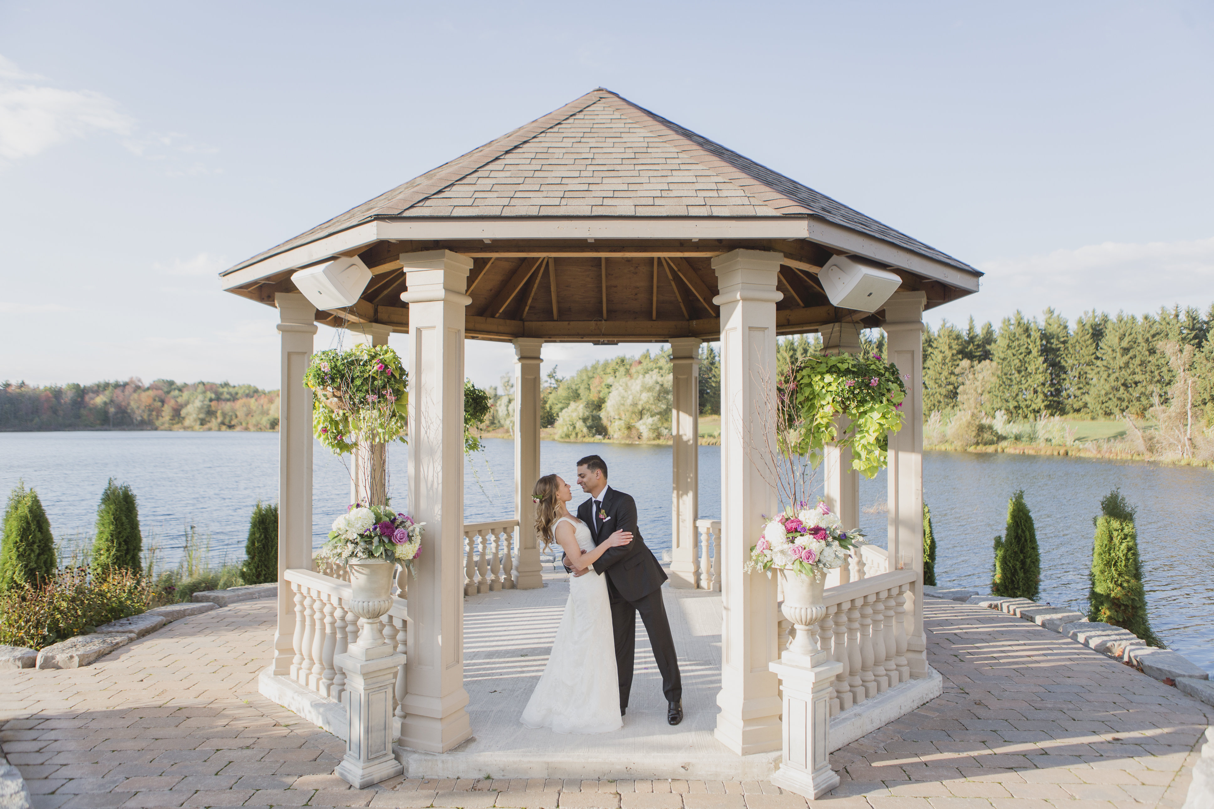 Fall wedding photos under a gazebo in Ontario. See more at Rebecca Chan Weddings and Events https://rebeccachan.ca