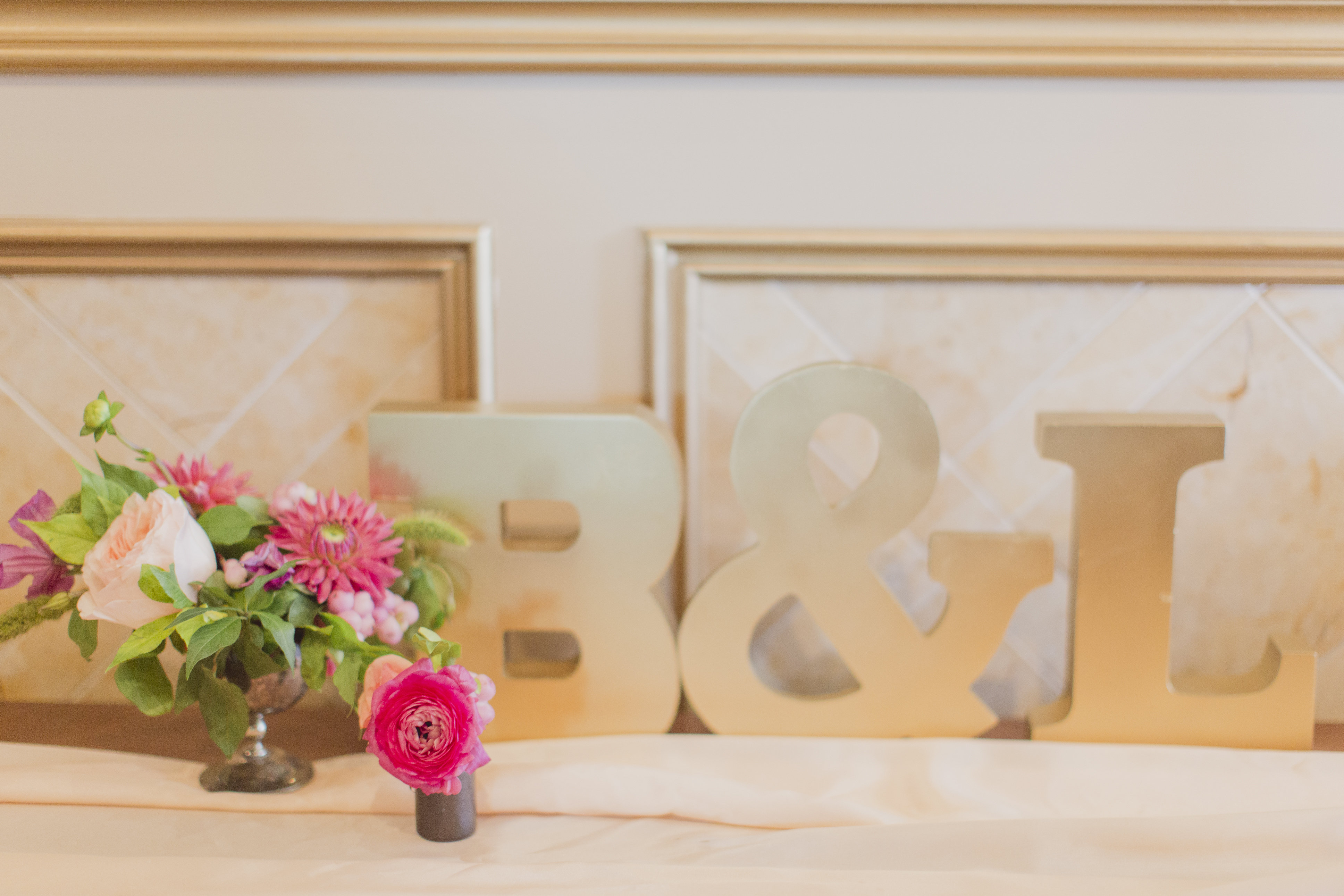 Dainty floral buds with wedding initials. See more at Rebecca Chan Weddings and Events https://rebeccachan.ca