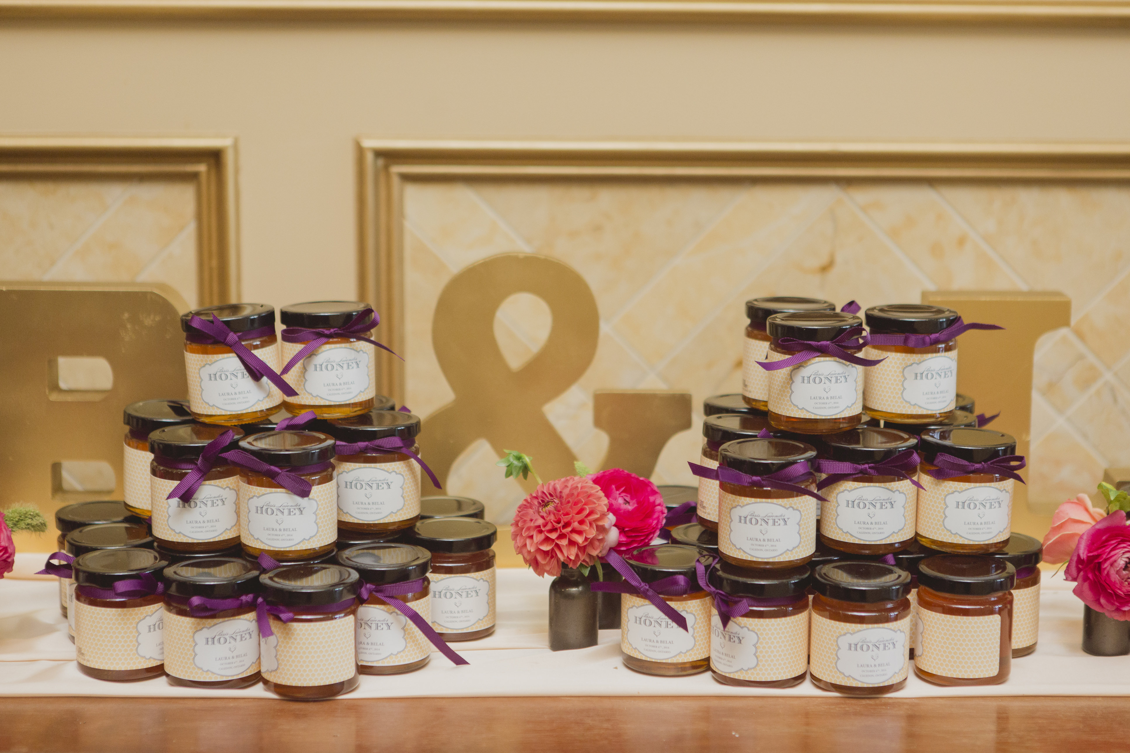 Honey jar wedding favours. See more at Rebecca Chan Weddings and Events https://rebeccachan.ca