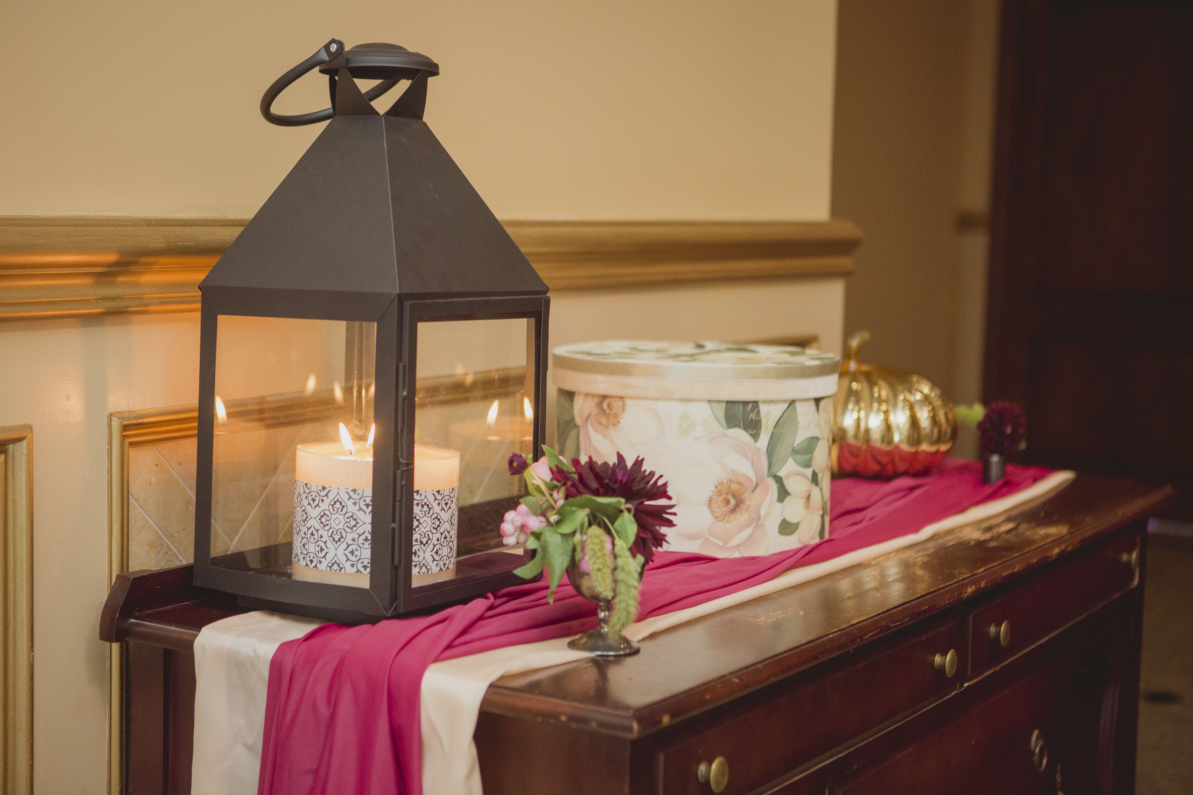 Romantic cranberry and blush receiving table. See more at Rebecca Chan Weddings and Events https://rebeccachan.ca