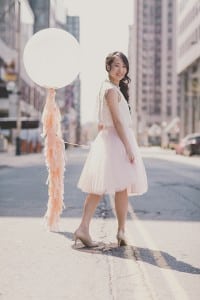 Coral and Gold Wedding Inspiration - Urban portrait with balloon and tassels. See more at Rebecca Chan Weddings and Events rebeccachan.ca