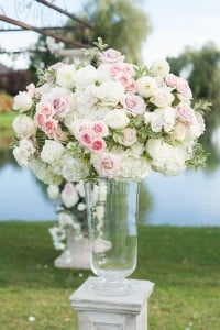 Blush Pink Ontario Winery wedding - Intimate ceremony with lush floral garland arch