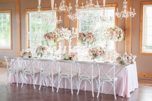 Blush Pink Ontario Winery wedding - romantic reception table with chandeliers