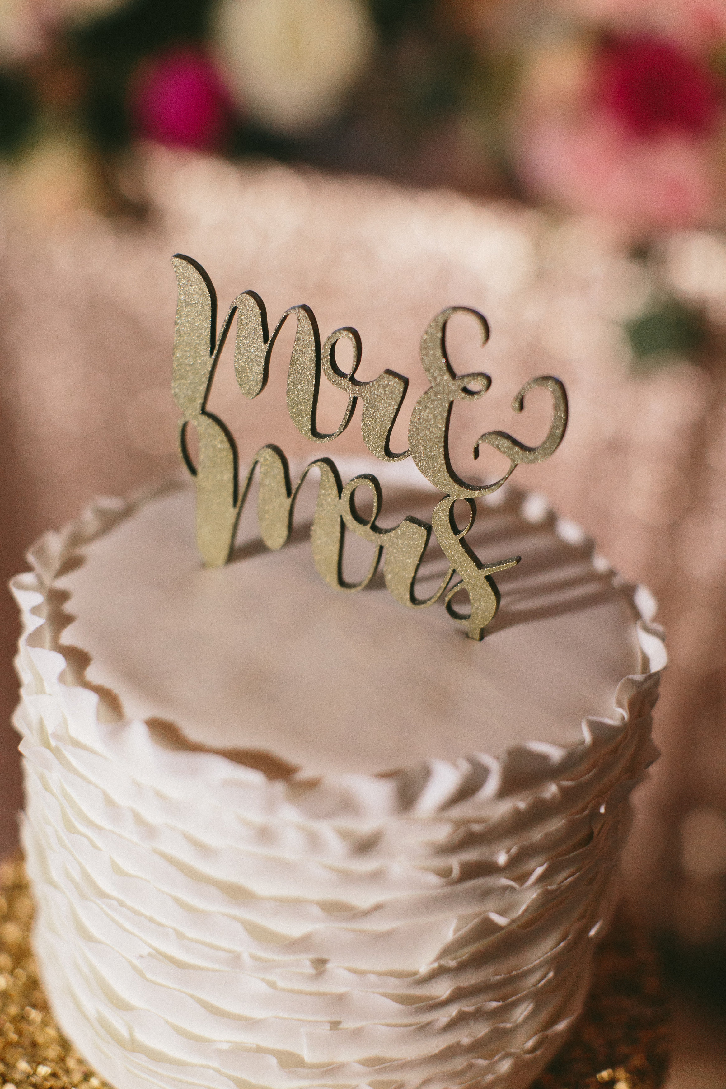 Sophisticated Garden-Inspired Wedding in Toronto at the Grand Luxe - Mr and Mrs cake topper