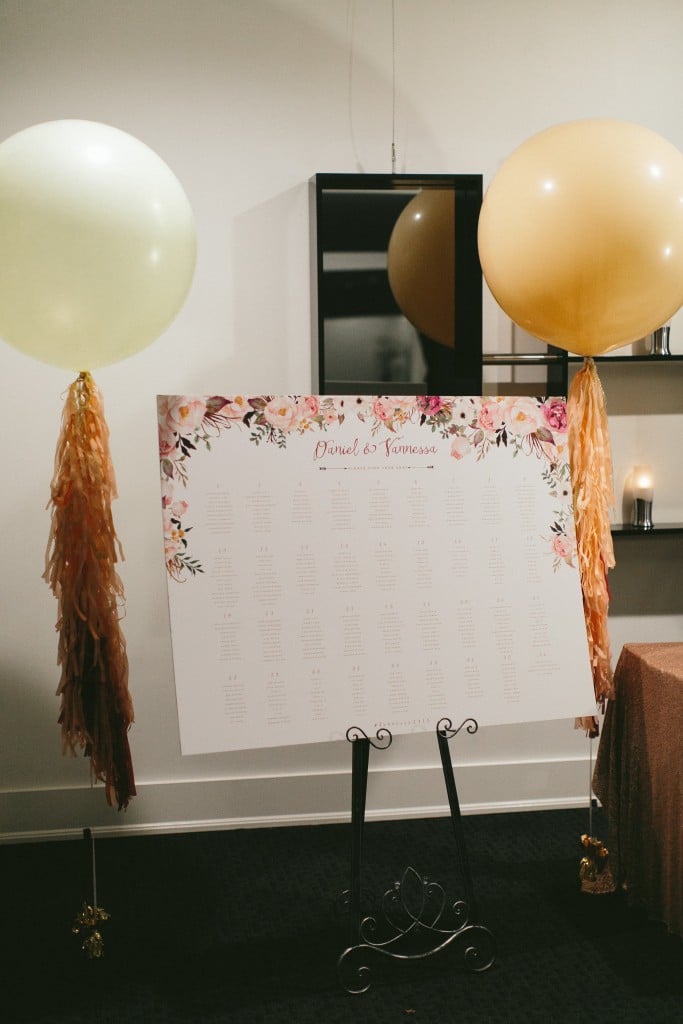 Wedding Day Stationary idea from a Sophisticated Garden-Inspired Wedding in Toronto at the Grand Luxe - Seating Chart with big balloons