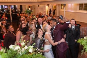 Couple's first selfie kiss - Berkeley Church casual winter wedding. See more at rebeccachan.ca