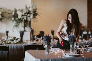 Intimate Burroughes Building wedding with string lights and lavender