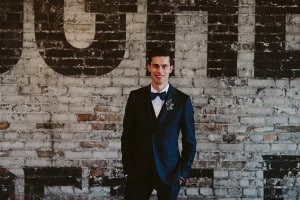 Intimate Burroughes Building wedding with string lights and lavender