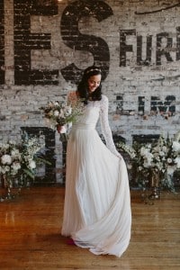 Intimate Burroughes Building wedding with string lights and lavender