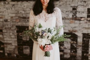 Intimate Burroughes Building wedding with string lights and lavender