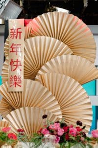 Gold Chinese fan backdrop - Chinese New Year decorating ideas as seen on Breakfast Television with Rebecca Chan Weddings and Events rebeccachan.ca