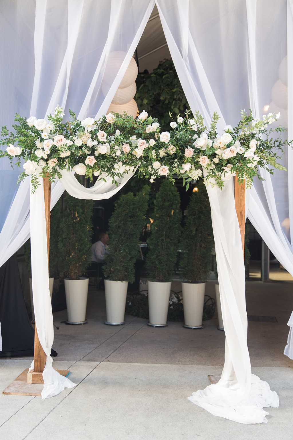 Romantic Urban Toronto Restaurant Wedding - Garden inspired floral arch