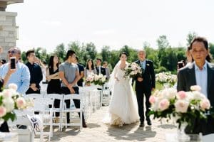 Luxurious blush garden wedding ceremony at Eagles Nest Golf Course