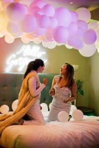 Electric Bedroom photobooth with balloons and LED lighting at One King West Hotel's Summer Social