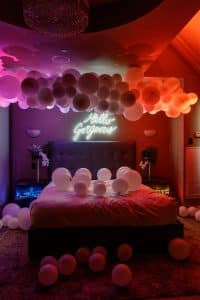 Electric Bedroom photobooth with balloons and LED lighting at One King West Hotel's Summer Social