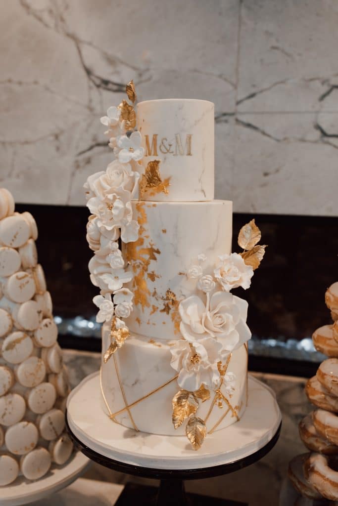 White and gold sweets table and wedding cake