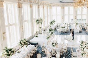 Luxurious white and gold wedding at Omni King Edward Hotel's Crystal Ballroom.