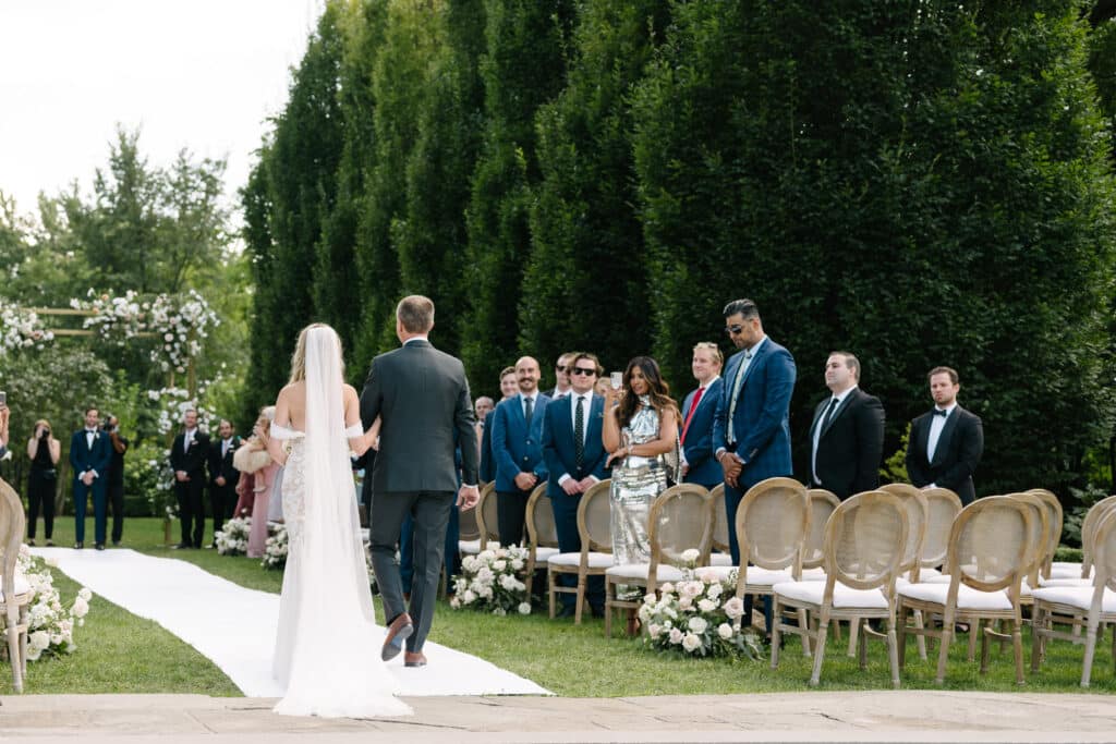 Wedding ceremony in garden - Classic and timeless Graydon Hall Manor Garden wedding. Planning by Rebecca Chan Weddings and Events.