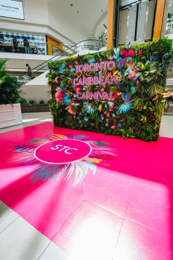 Toronto Caribbean Carnival at Scarborough Town Centre neon backdrop - Design created by Rebecca Chan Weddings and Events