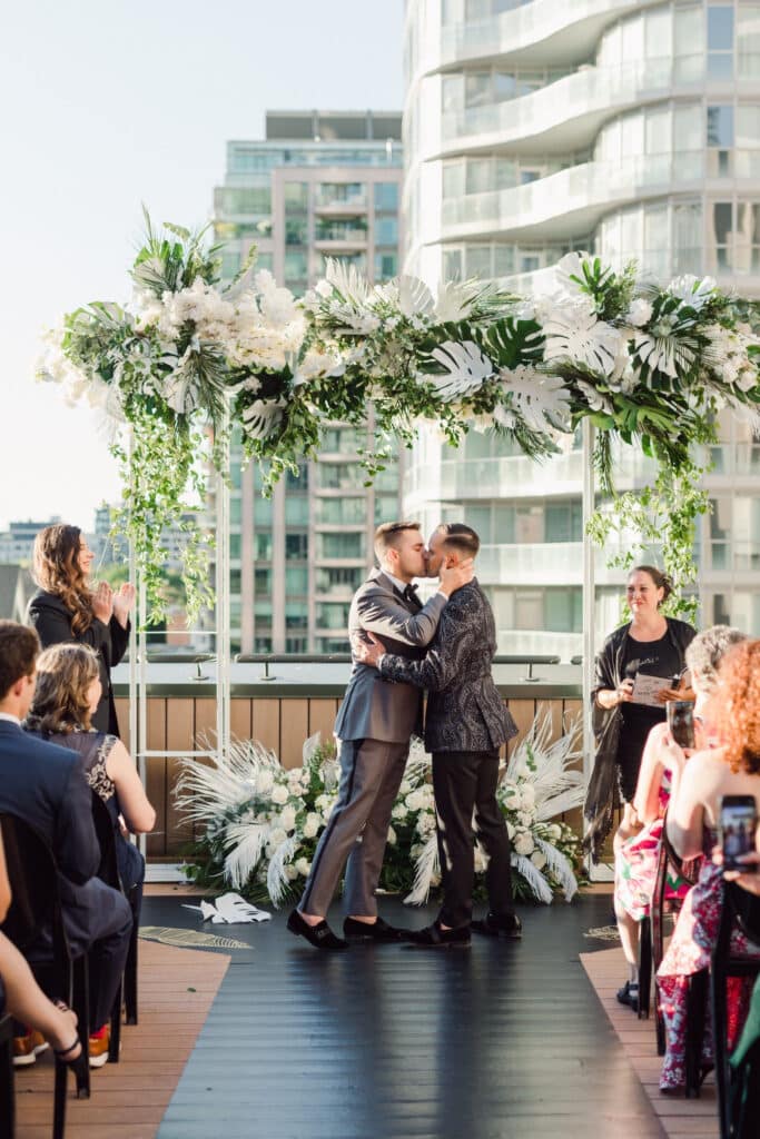 Tropical wedding for two grooms at Harry Rosen. Planned by Rebecca Chan Weddings & Events