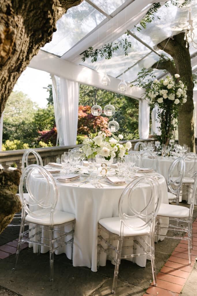 Graydon Hall Manor Wedding - Reception on the Terrace with white roses and greenery. Planned by Rebecca Chan Weddings & Events