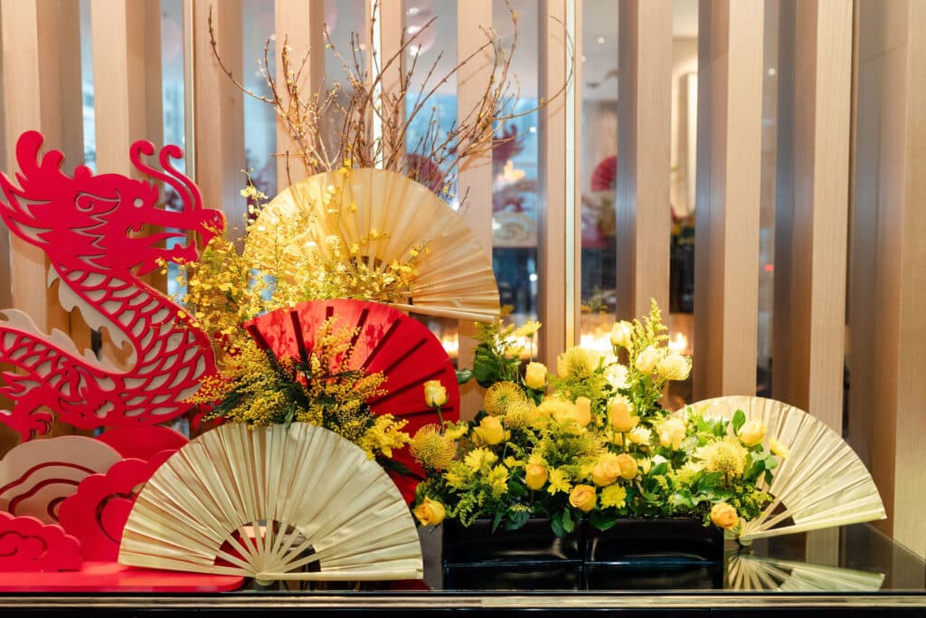 Lunar new year decoration with dragon, lanterns, fans and flowers, designed for Shangri-La Hotel Toronto's lobby activation.