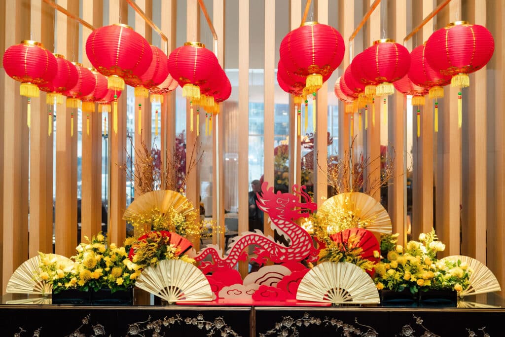 Lunar new year decoration with dragon, lanterns, fans and flowers, designed for Shangri-La Hotel Toronto's lobby activation.