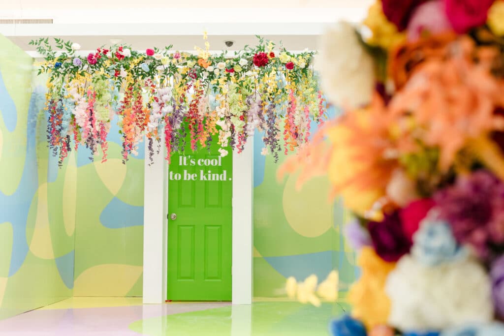 Keys to kindness mall activation with hanging flowers at Oshawa Centre