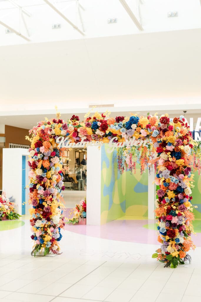 Colourful flower arch - Oshawa Centre Kindness Garden with unique floral installations