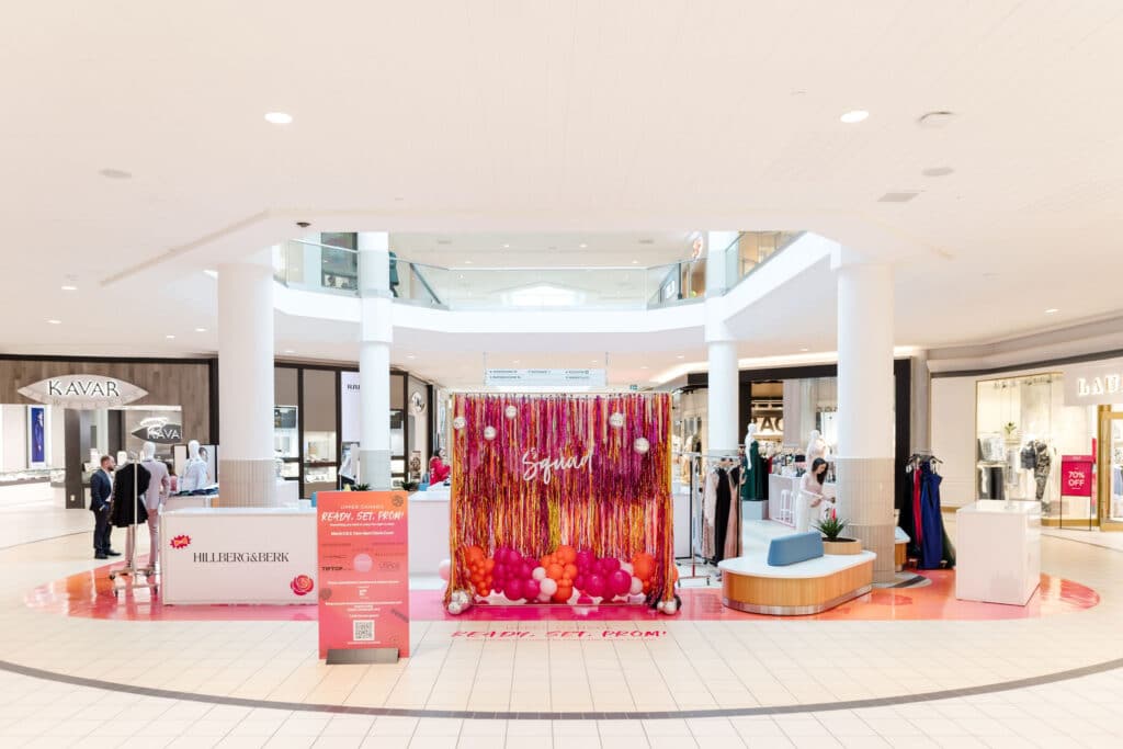 Prom decor idea: Custom made pink and orange fringe backdrop with disco balls and balloons - Prom pop up at Upper Canada Mall