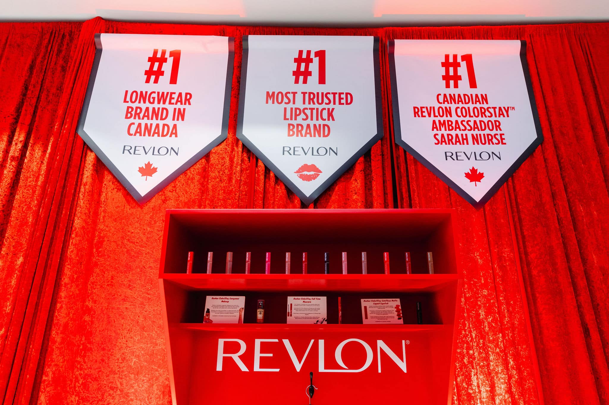 20250425-37 Revlon Hockey Themed Brand Activation - Player locker with Sarah Nurse jersey, championship banners and product display