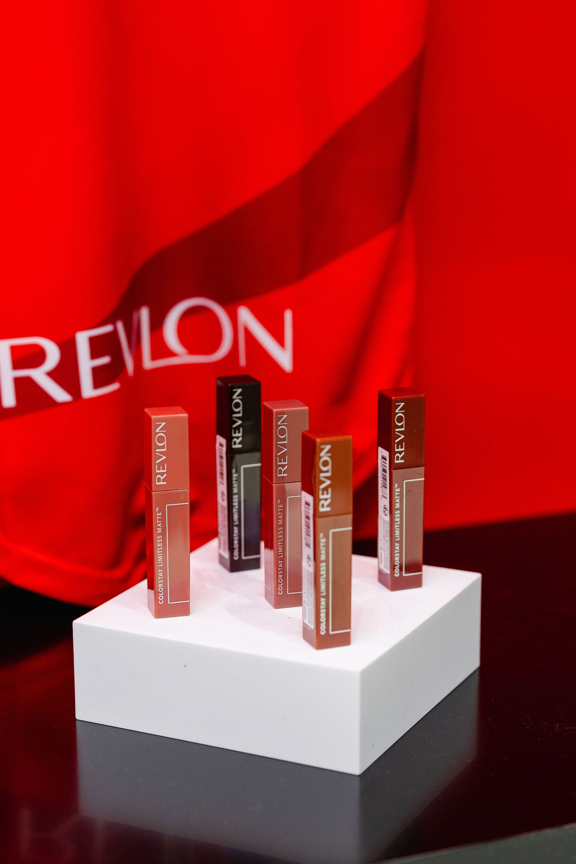 Revlon claim banners
