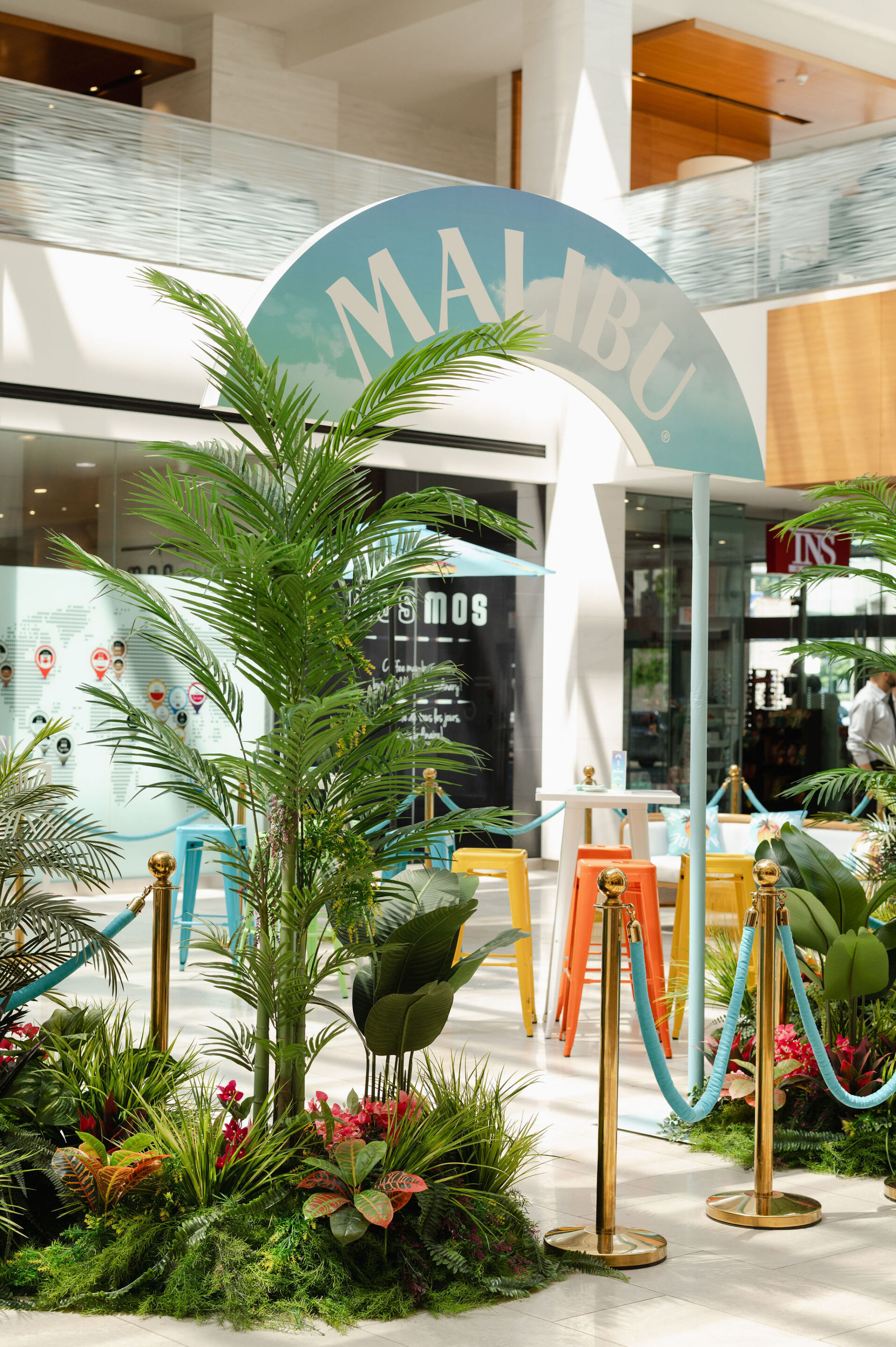 Malibu Brand Activation elevator pop up bar entrance arch with tropical plants