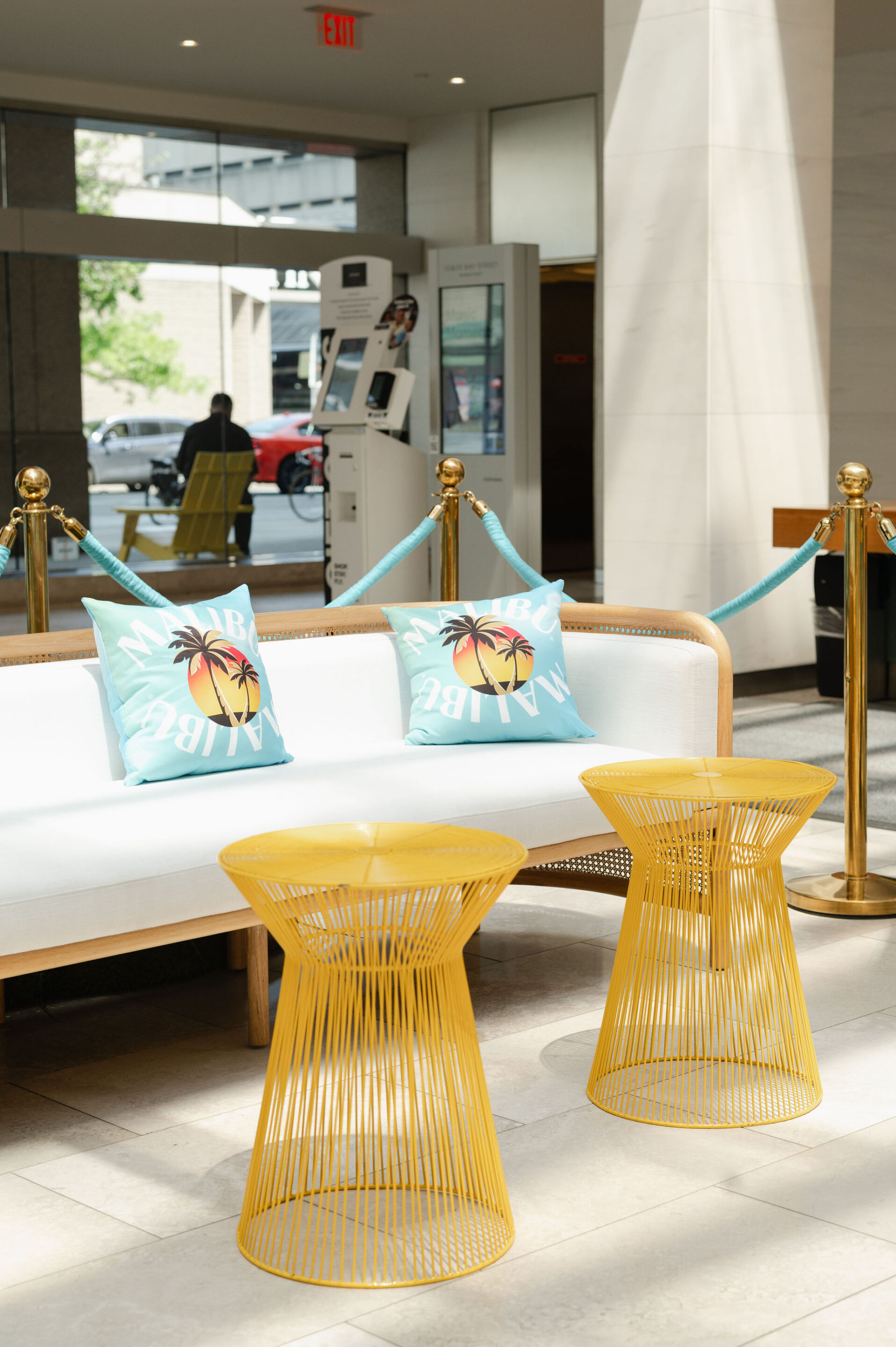 Malibu pop up with branded pillows and colourful lounge furniture