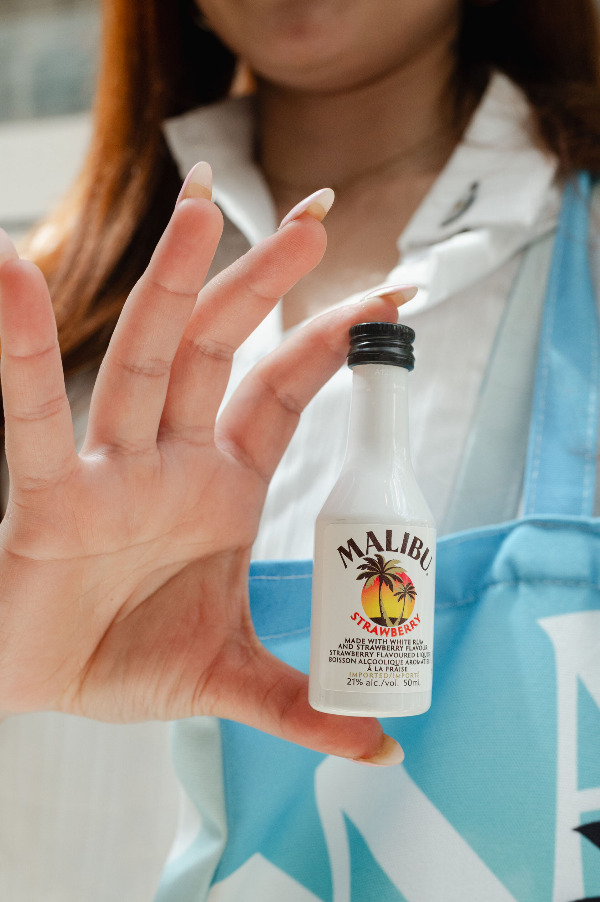 Malibu Brand Activation elevator pop up bar with colourful tropical plants and brand ambassadors