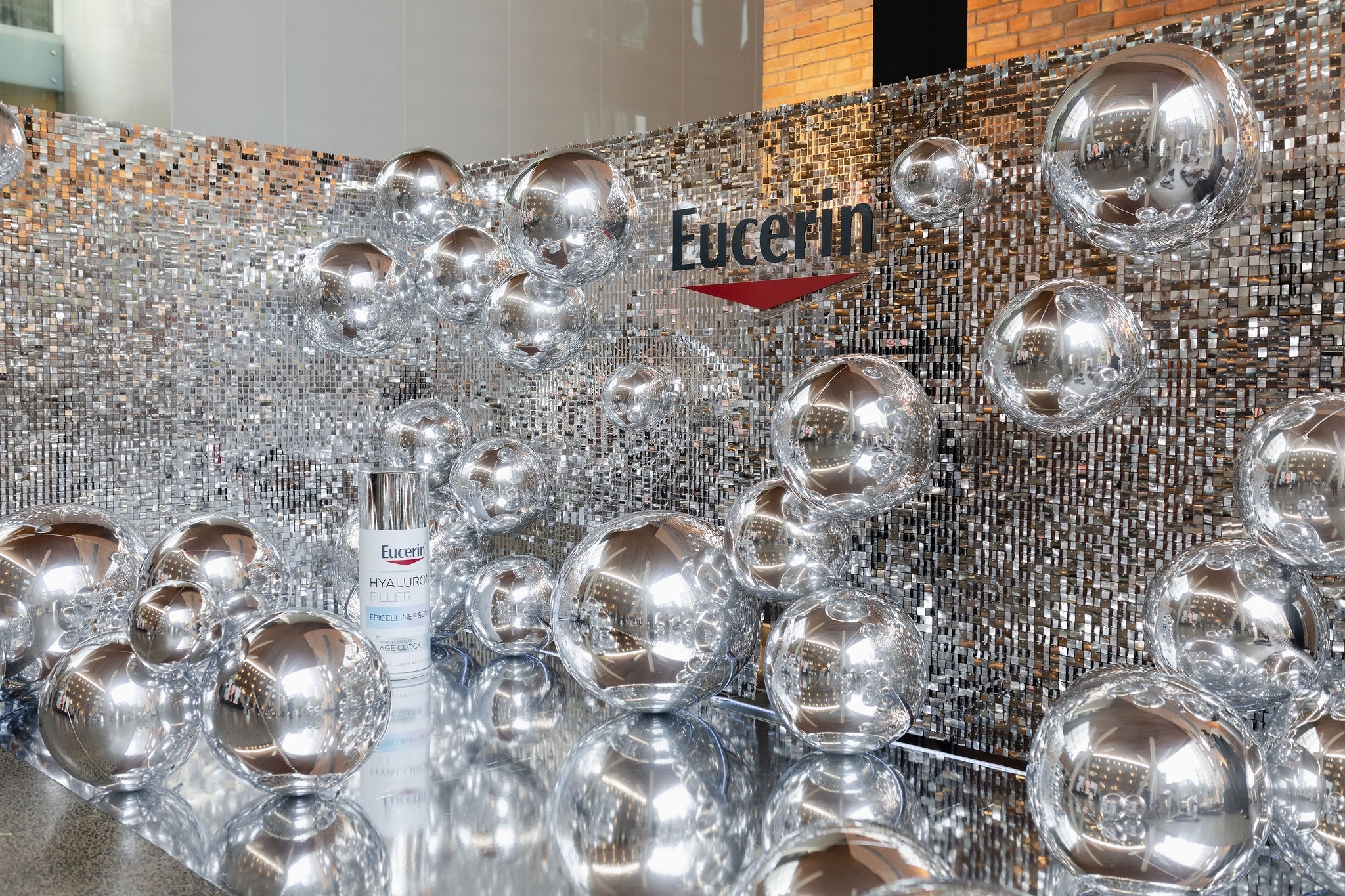 Eucerin silver photo backdrop with silver orbs and sequin backdrop - Eucerin Epicelline Serum Launch Event